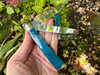 A dual-blade ritual knife with a blue horn handle is a 2-in-1 tool for the working witch. Featuring both a sharply pointed blade (spey) which is ideal for use as an athame and a more rounded blade (clip) perfect for use as a boline.
