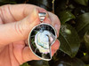 Crafted with attention to detail, this pendant seamlessly blends the shimmering elegance of black lip shell, mother of pearl, and abalone, set in sterling silver.