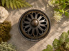 Top view of lotus enamel incense bowl with decorative vented lid and bronze Greek key border.