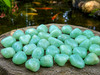 Close-up of large Natural Aquamarine tumbled stones highlighting their polished finish and calming ocean-blue hues.