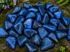 Close-up of Natural Dumortierite crystals highlighting deep blue tones and distinctive natural mineral patterns.