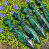 Close view of Ruby in Zoisite crystal athames showing vivid green stone with natural ruby-red and dark mineral patterning.