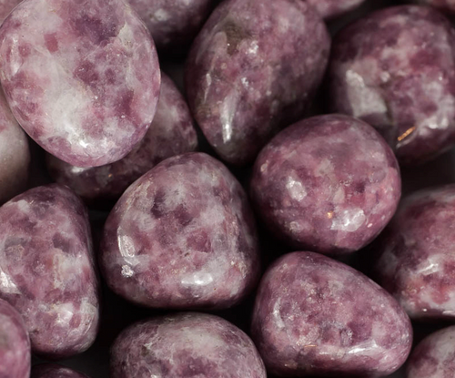 Lepidolite is one of the most useful minerals for calming frayed nerves, helping to release stress and worry and setting one on the path to acceptance. As a stone of serenity, lepidolite extends this 'feeling' into many directions. It encourages one to respond without hostility or defensiveness, to find the path of harmonious action and pathways to learn from these actions. 
