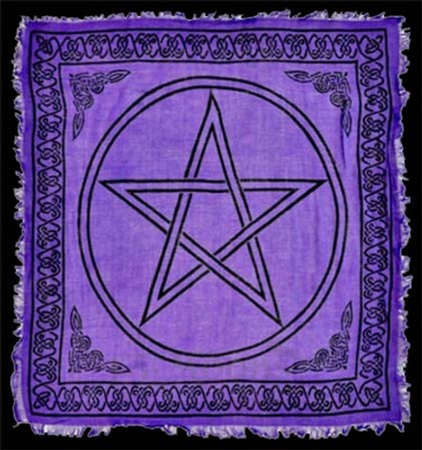 one purple pentacle fringed altar cloth lies on a black background to show the knotted edge design. this cloth is perfect for altars, tarot wraps, and sacred space.
