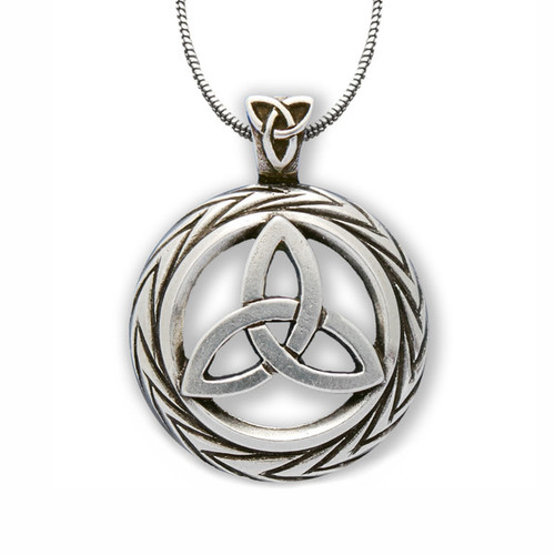 One triquetra pendant necklace is lying on a white table.
