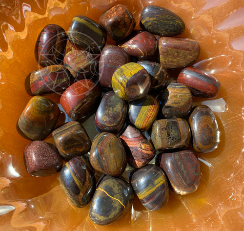 Tiger Iron is energetically dynamic, anchoring your energies in alignment with the chakras and body with no dulling of your consciousness. With its strong ties to grounding, it is especially beneficial for those who may be a little spacey by bringing them down to Earth.