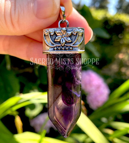 Amethyst Pendant with Opalite and Amethyst Tibetan Silver. Beautiful Amethyst is the focal point of this stunning gemstone pendant. The ornate Tibetan Silver setting features an AA+ grade amethyst teardrop and an iridescent opalite cabochon. Wear your intentions with beautiful crystal jewelry. Spectacular!