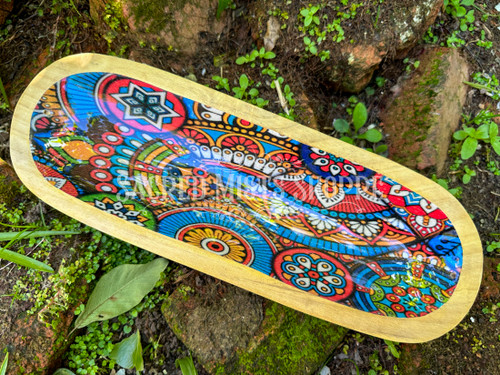 Colorful handmade wooden ash catcher with vibrant floral and mandala patterns in red, blue, yellow, green, and black. The incense burner is trough style and is perfect for burning two sticks of incense at a time.