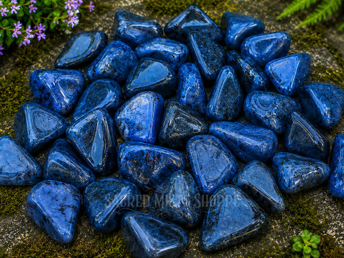 Close-up of Natural Dumortierite crystals highlighting deep blue tones and distinctive natural mineral patterns.