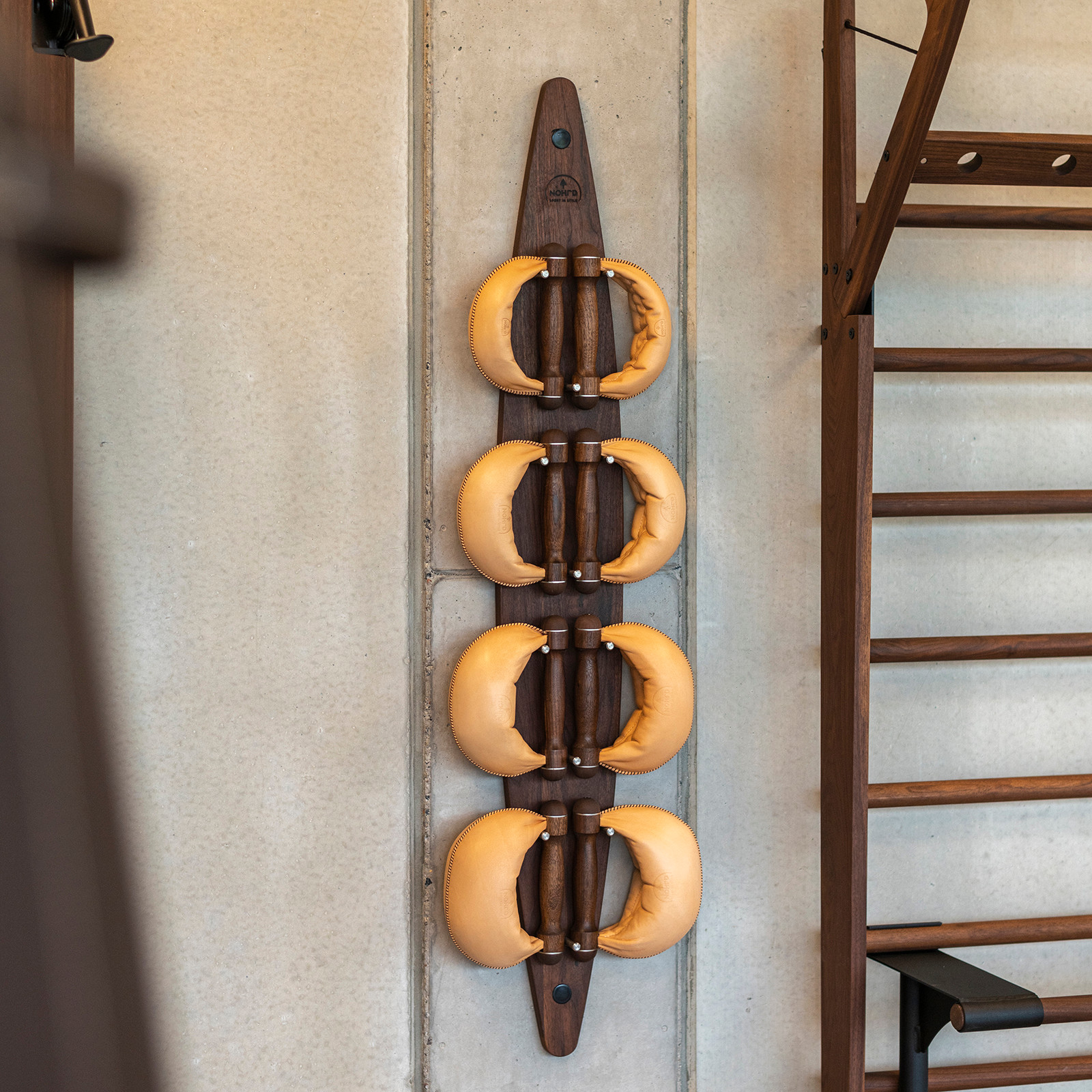 NOHrD SwingBell Wall Rack in Walnut by NOHrD-WaterRower for Jack Game Room