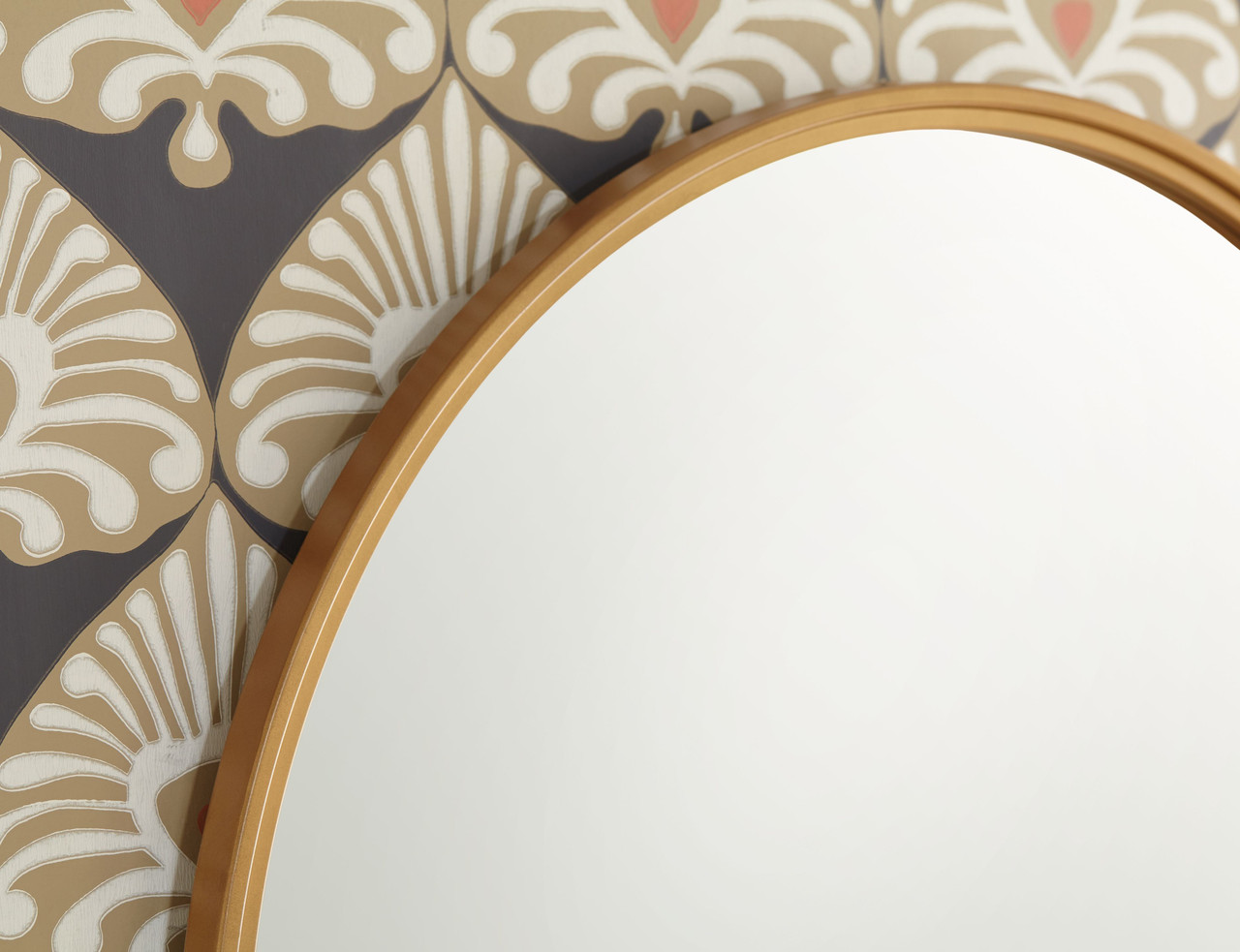 The Brocky Gold Finish Accent Mirror Round sold at Hilton Furniture serving  Houston, TX ands surrounding areas.