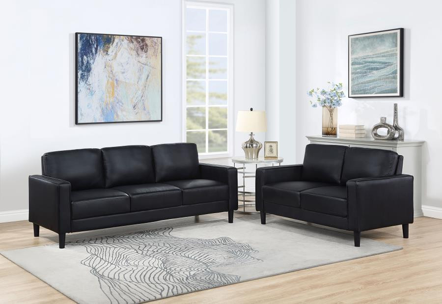 The Ruth 2 Piece Upholstered Track Arm Faux Leather Sofa Set Black sold at  Hilton Furniture serving Houston, TX and surrounding areas.