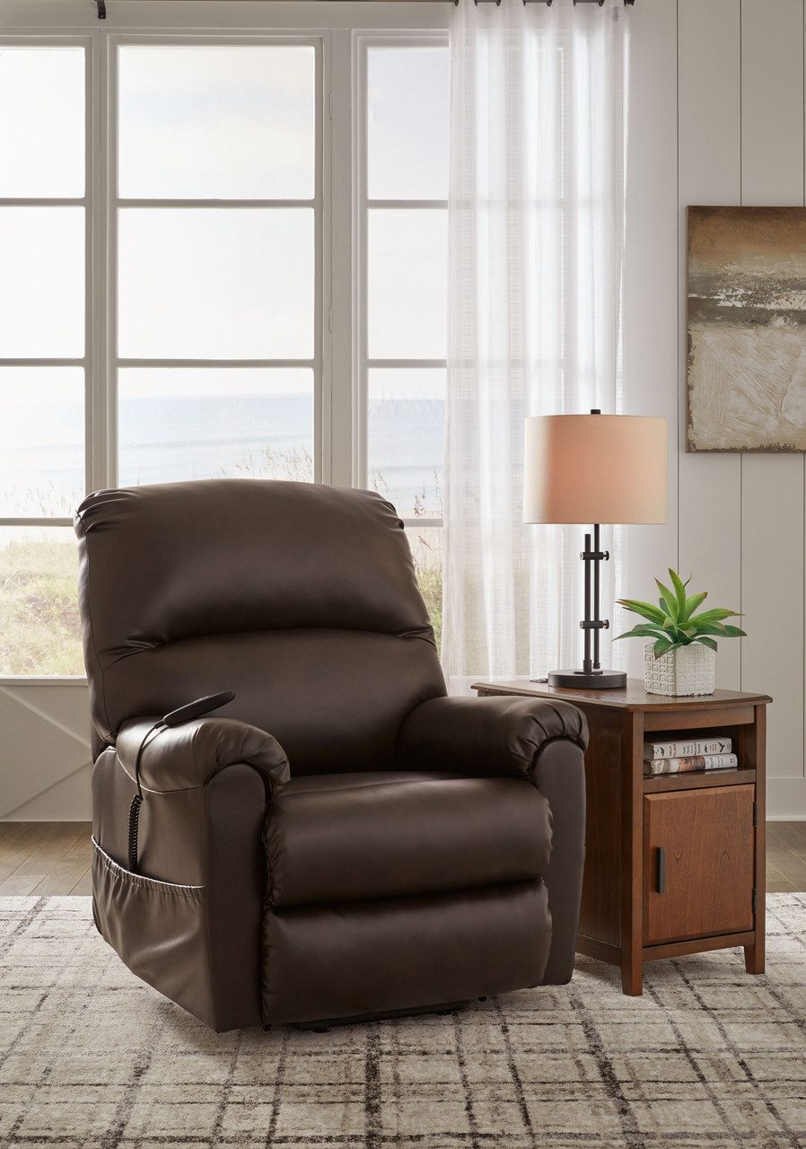 The Shadowboxer Chocolate Power Lift Recliner Faux Leather sold at