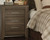 Juararo Dark Brown 8 Pc. Dresser, Mirror, Chest, California King Panel Bed & 2 Nightstands