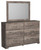 Ralinksi Gray 7 Pc. Dresser, Mirror, Chest, King Panel Bed, 2 Nightstands