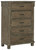 Shamryn Grayish Brown Five Drawer Chest