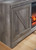 Wynnlow Gray 63" TV Stand With Glass/stone Fireplace Insert