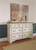 Realyn Two-tone 8 Pc. Dresser, Mirror, Chest, Queen Upholstered Sleigh Bed, 2 Nightstands