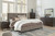 Wittland Brown California King Upholstered Panel Bed