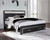 Kaydell Black King Upholstered Panel Storage Platform Bed