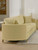 Corliss - Upholstered Curved Track Arm Loveseat - Camel