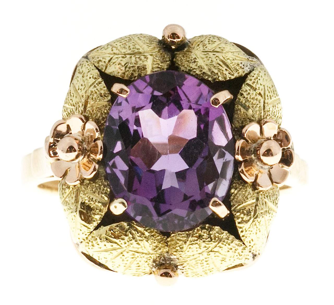 Sold at Auction: 0.14 Carat Natural Purple Diamond Halo Ring