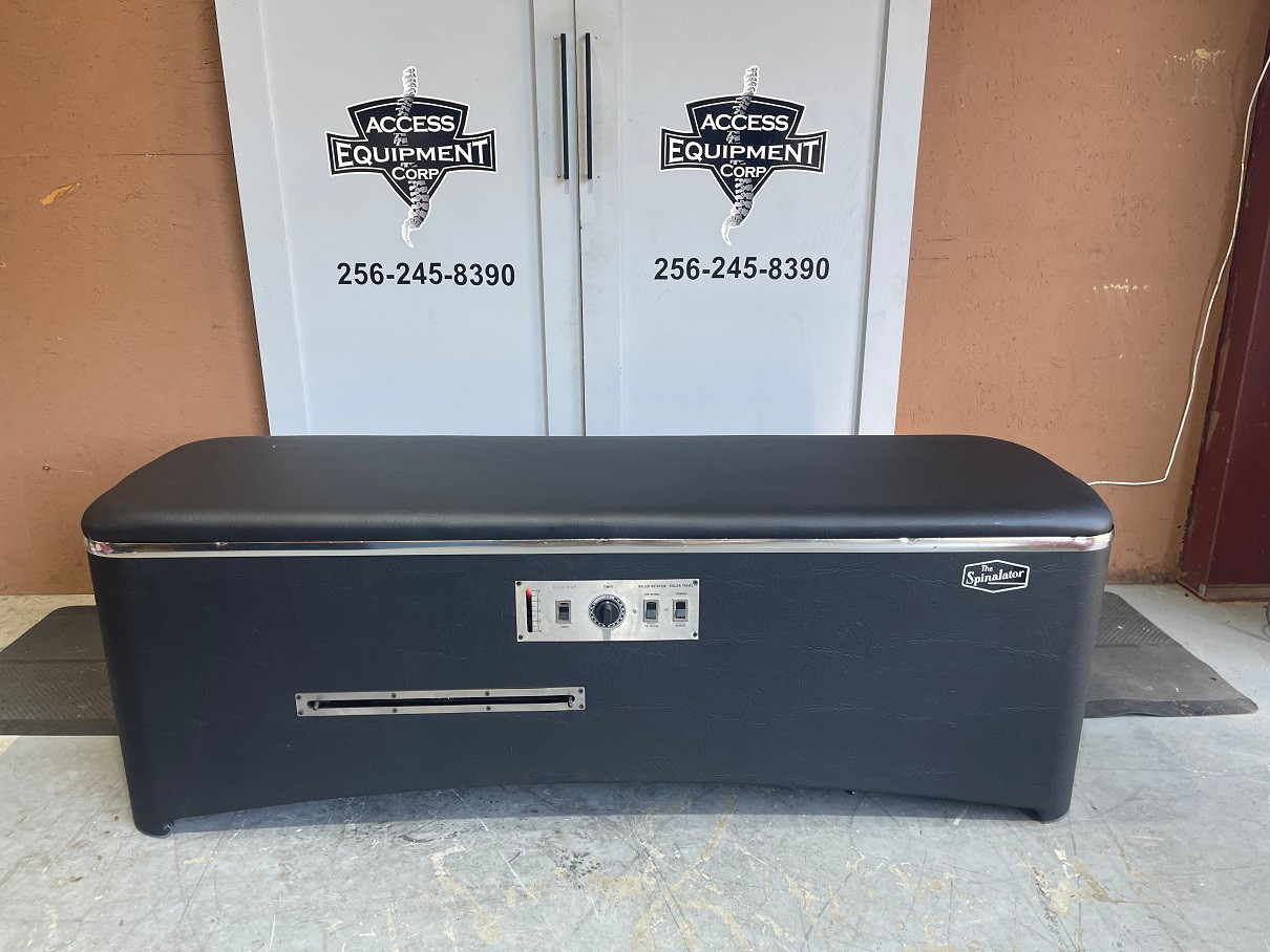 Used Spinalator Table with Accutrac for Sale