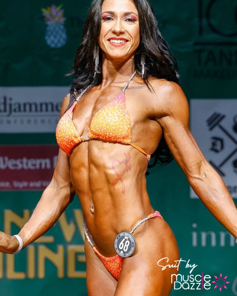 Muscle Dazzle's Super Bright Neon Orange Bikini for Champions