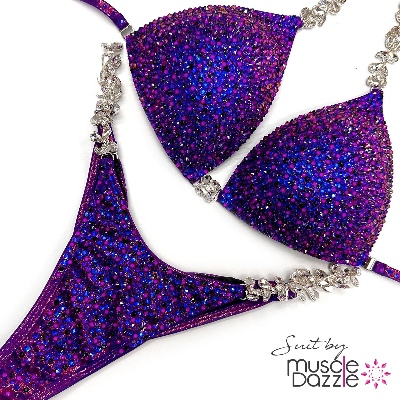 Sparkle on Stage: Muscle Dazzle's Deep Violet Crystal Bikini