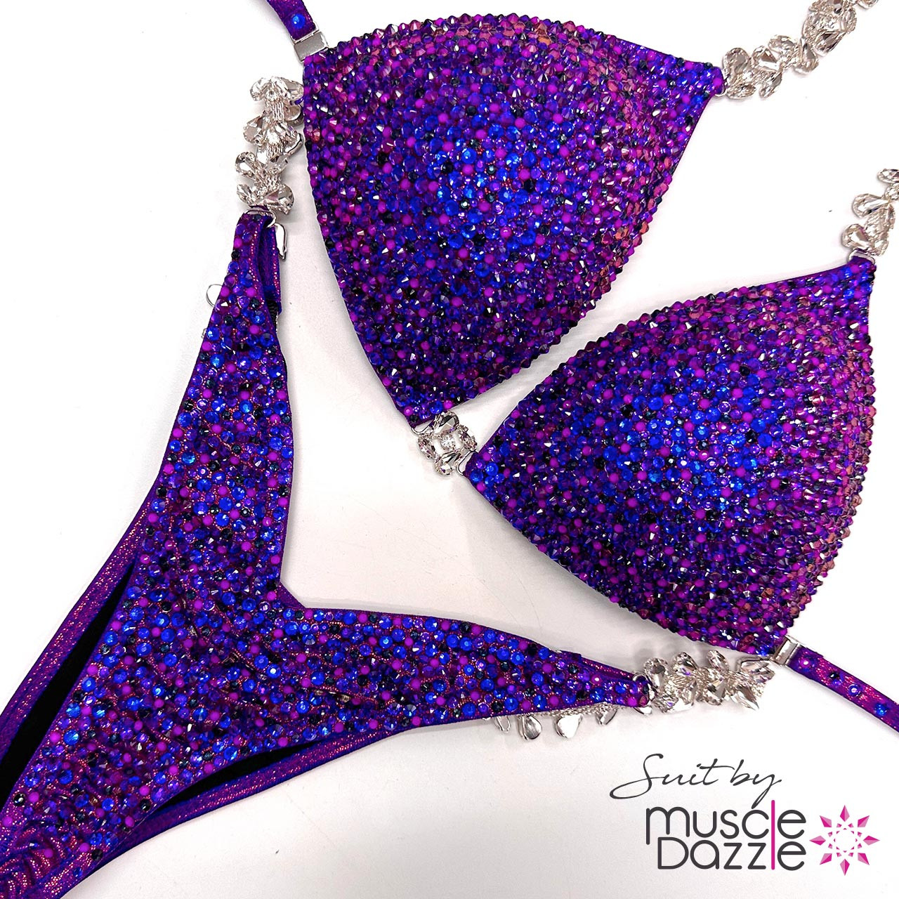 Sparkle on Stage: Muscle Dazzle's Deep Violet Crystal Bikini