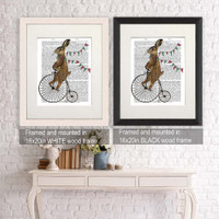 Rabbit on Penny Farthing - Shown in Frames