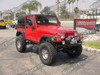 Rubicon Express 5.5" Long Arm Tri-Link Suspension System, Walker Evans Racing Adjustable Reservoir Shocks, Currie Front And Rear Differential Covers, Optima Battery, Hi-Lift Jack, Polished 17x8 Walker Evans Wheels With Black Rings, 35x12.50x17 Toyo Open Country Mud Terrain Tires.