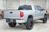Rear view of lifted silver 2015 toyota tundra