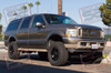 2003 Ford Excursion - 4" Lift - BDS / Fox - XD Wheels - Falken Tires