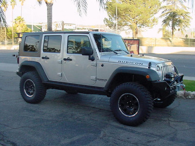 Icon Vehicle Dynamics 4" JK Lift System, Icon Vehicle Dynamics Front and Rear Nitrogen Charged Shocks, Daystar 1.75" Front Level Spacer, J.E. Reel Front and Rear CV Style Driveshafts,  Icon Vehicle Dynamics 4" JK Lift System, Icon Vehicle Dynamics Front and Rear Nitrogen Charged Shocks, Daystar 1.75" Front Level Spacer, J.E. Reel Front and Rear CV Style Driveshafts, 17x8 American Eagle #140 Wheels Black and Machined Finish, 35x12.50x17 BF Goodrich M/T KM-2 Tires