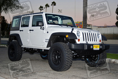 Rubicon Express 3.5" Super-Flex Suspension Lift System, Front 1310 CVO Driveshaft Upgrade, Bilstein Performance Front and Rear Shocks, 17" ProComp '7032' Xtreme Alloy Wheels in Black Finish, 35x12.50x17 BF Goodrich Mud Terrains, Black Billet Locking Fuel Door, MBRP JK Spare Tire Relocator Bracket (To Fit 35" Spare)