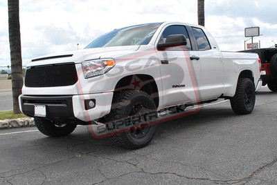 ReadyLift 3" Front Leveling Kit,18x9 Black Rhino Matte Black Wheels Mounted to 33x12.50x18 Toyo Open Country R/T Tires, and a T-Rex Billet Black Formed Mesh Grille Insert.