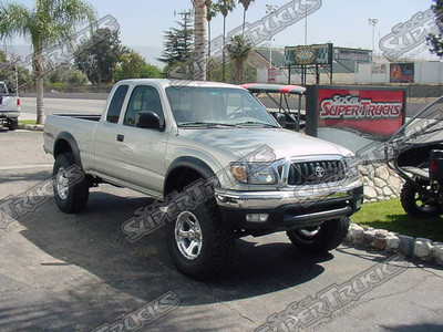 Donahoe Racing 3" Coilover Replacement Lift System, Deaver Rear Leaf Springs, Bilstein Rear Shocks, Polished 16x8 Dick Cepek Wheels, 285/75/16 BF Goodrich All Terrain Tires