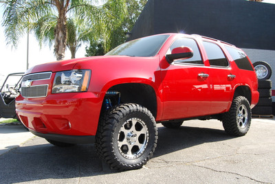 CST Performance 4" Suspension System, King Shocks Custom Coil-Over Remote Reservoir Front Shocks, King Shocks Custom Piggy Back Rear Shocks, 18x8.5 Ultra Rogue Wheels Machined Finish, 33x12.50x18 Toyo Open Country M/T Tires, Custom Victory Red Paint By Valley Collision