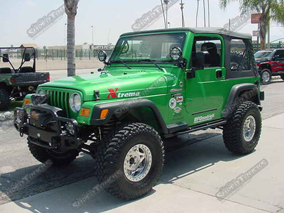 Rubicon Express 4.5" Suspension System, Currie HD TieRod Kit, Slip Yoke Eliminator CV Driveline, Currie D60 Rock Jok Rear End, Super 35 Front End, Body Armor Swing Away Rear Bumper w/ Hi-Lift Mounts, Fuel Cans, Body Armor Front Tubular Bumper with Mile Marker Winch 6" Auxilary Lights, Body Armor Side Guards, Custom Painted "Rock Hard" Bolt-in Interior Cage and 17" Walker Evans Bead Lock Wheels Wrapped with 35" BFGoodrich Mud Terrain Tires