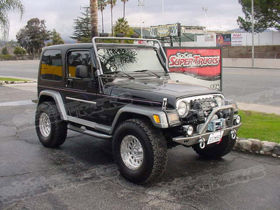 Warn Industries Rock Crawler Front Bumper and Winch Plate, Warn Industries Grille Guard Accessory, Warn Industries Rock Crawler Rear Bumper, Warn Industires 9500LBC Powerplant Winch, Baja Designs Fuego HID Driving Lights Chrome Finish, 16x8 American Eagle Wheels Series 102 Polished Finish, 285/75/15 BF Goodrich A/T Tires