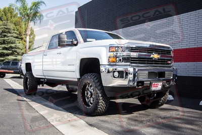 CST Performance Suspension 6-8" Lift System Utilizing Factory Front Shocks with Extensions and Bilstein 5100 Series Rear shocks. 20x9 BMF Novakane Wheels in Death Metal Black with Machining Mounted to 35x12.50x20 Toyo Open Country M/T Tires. B&W 20,000lbs Companion 5th Wheel Hitch with a TurnOverBall Goose Neck Under the Bed Mounting System and Amp Research Electric Power Steps.