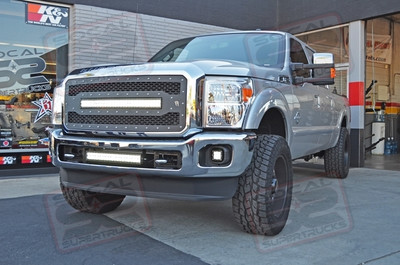 Readylift 1.5" Leveling Kit, 20" Black/Milled Procomp #5183 Wheels Wrapped w/35x12.50x20 Toyo Open Country AT2 Tires, Rigid Industries LED Grille w/30" E-Series Light Bar, Fog Light Brackets w/Dually Series Lights, 20" E-Series Light Bar Mounted In Between The Front Tow Hooks, Amp Research Power Steps