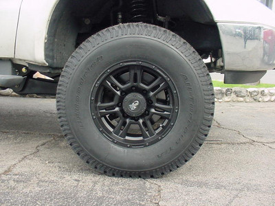 17" Pro Comp '7047' Flat Black Wheels Wrapped With 315/70/17 BF Goodrich A/T Tires