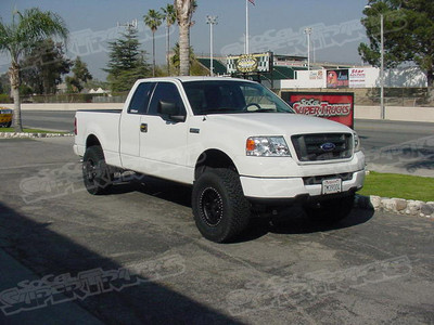 6" Fabtech Basic Suspension System, 17x8.5 Pro Comp Xtreme Alloy Wheels Cast Black Finish, 315/70/17 BF Goodrich A/T Tires