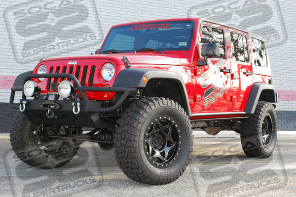 Icon Vehicle Dynamics 4" Jeep JK Suspension System, Icon Vehicle Dynamics OMEGA Series 2.5" Piggyback Bypass Shocks With Compression and Rebound Adjustment, 20x8.5 Walker Evans Racing Street Lock Wheels Powdercoated Black Finish, 325/60/20 BF Goodrich M/T KM2 Tires, AFE Stage II Air Intake System, AFE Throttle Body Spacer Kit, AFE Cat-Back Exhaust System, 5.38 Gearing, Superchips Flashpaq Programmer, Smittybilt XRC10 Winch With Synthetic Rope and Aluminum Fairlead Smittybilt XRC10 Winch With Synthetic Rope and Aluminum Fairlead, Smittybilt XRC Rock Sliders, and Smittybilt SRC Front & Rear Bumpers With Swinging Spare Tire Mount.