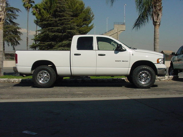 CST 4" Spindle Lift System, 17 x 8 Polished American Racing "Mojave" Wheels, 295/70/17 Nitto Terra Grappler Tires