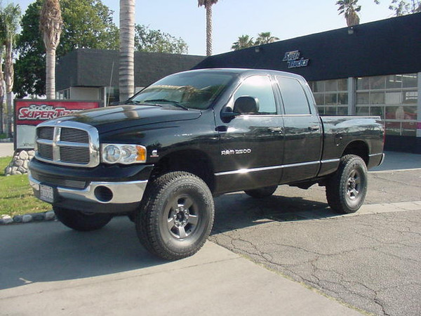 Carli Leveling Suspension System (Includes Carli Dual Rate Front Coil Springs, Bilstein 5100 Series Front Shocks, Carli Stainless Steel Front Sway Bar End Links) Carli Suspension Adjustable Front Pan-Rod Bar, Carli Suspensoin Mild Steel Front Control Arms, Bilstein 5100 Series Rear Shocks, 315/70/17 Yokohama Geolander A/T-S Tires, Stock Dodge 8-Lug Wheel Custom Grey Finish