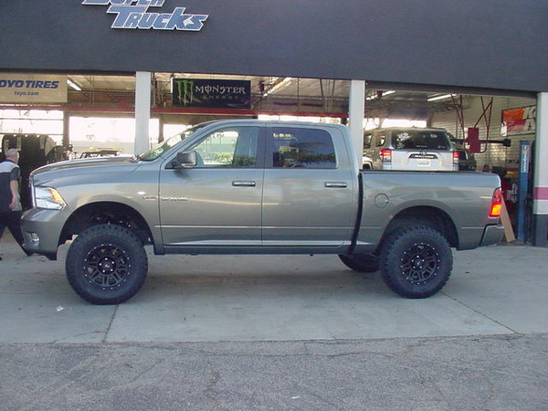 CST Performance Suspension 7" Lift System, Rancho RS9000XL Shock Absorbers, 18"x9" ProComp #7005 Wheels in Matte Black Finish, 35x12.50x18 ProComp X-Treme A/T Tires & an AFE Cold-Air Intake System