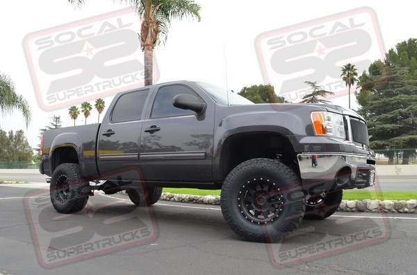 6" BDS Suspension Kit w/Fox 2.5 Remote Reservoir Coil Overs and 2.0 Rear Monotube Shocks, 17" Black Method Race Wheels (The Standard) Wrapped w/35x12.50x17 Toyo Open Country AT2 All Terrain Tires, Amp Research Powersteps, SuperChips Flash Paq Power Programmer, T-Rex Upper Class Black Mesh Grille